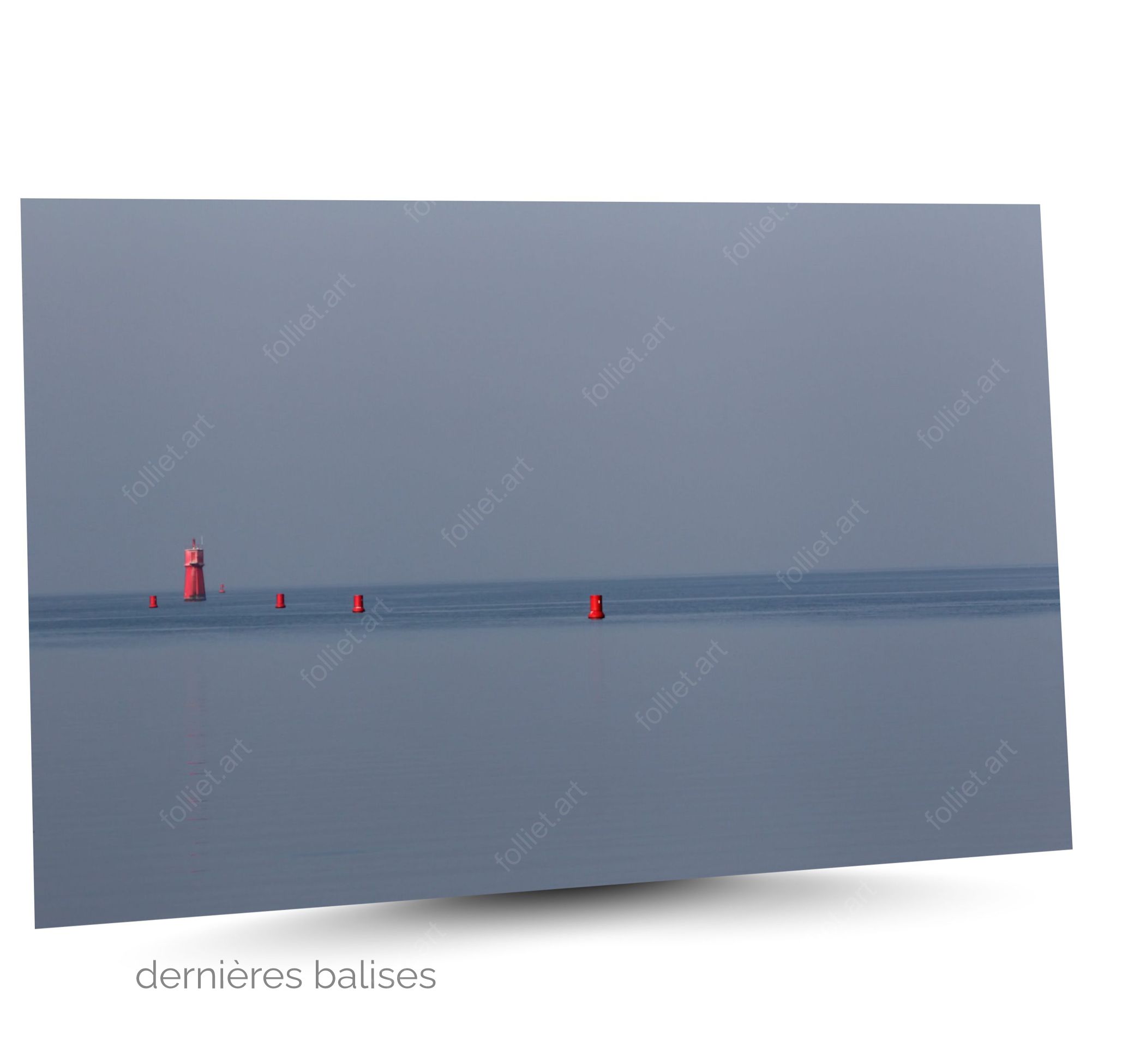 Red buoys and lighthouse in a calm scene of blue ocean - art photography signed Folliet